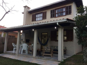 Casa de Praia e Vaga de Estacionamento